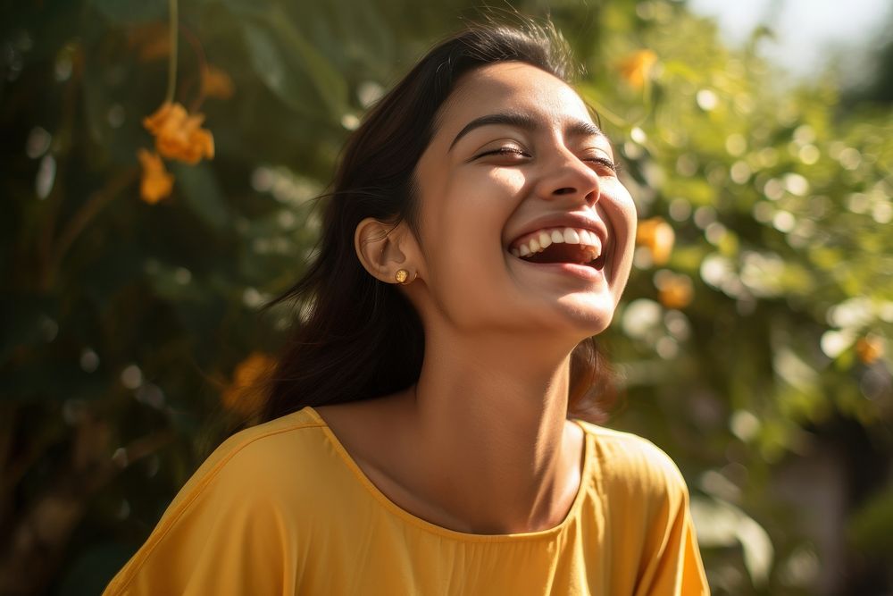 Laughing young south asian woman smile adult joy.