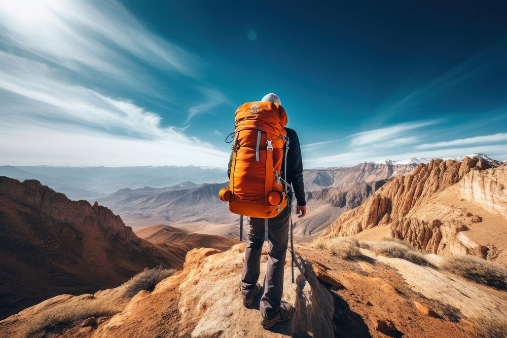 Man hiking on mountain backpack backpacking adult.