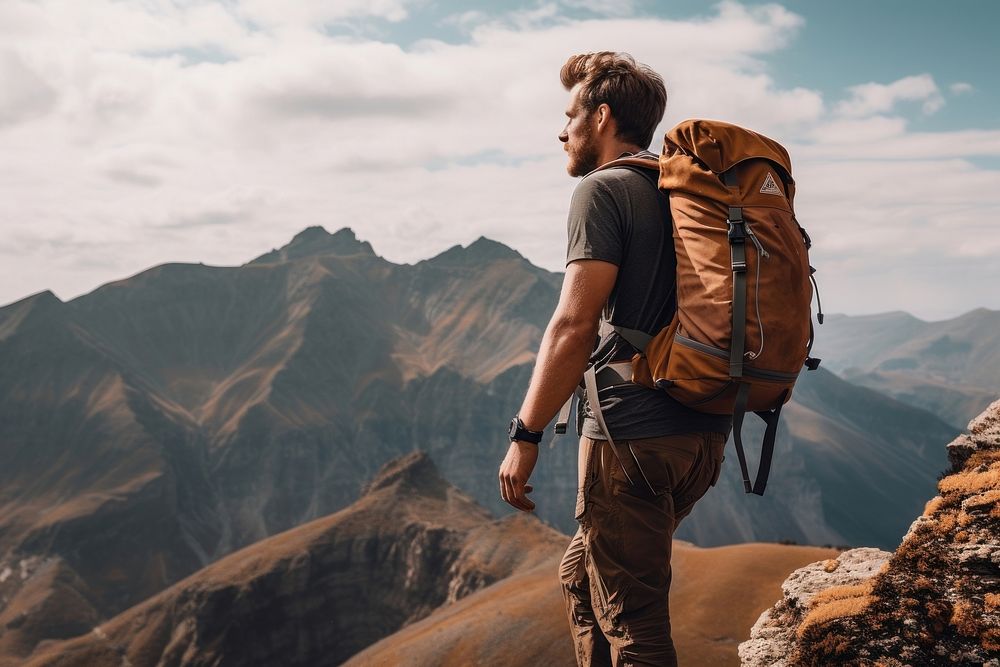 Man hiking on mountain backpack backpacking adult.