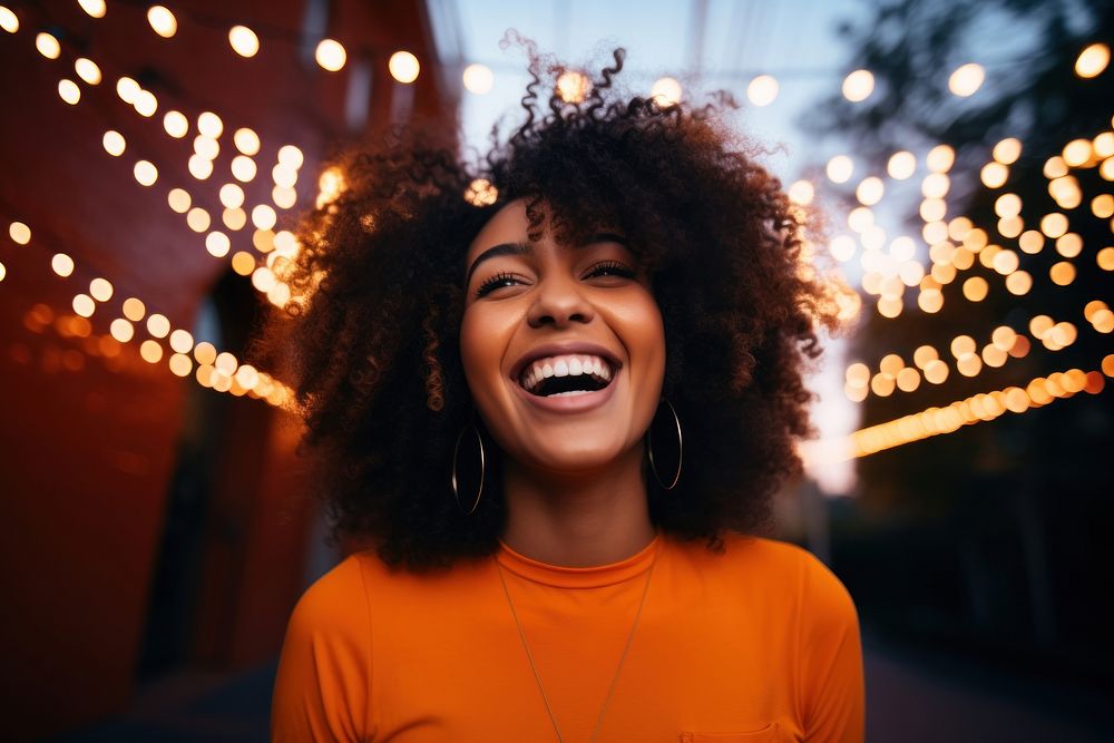 Black woman laughing smiling.