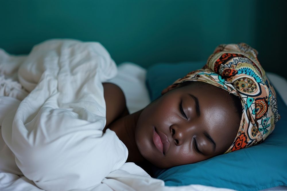 Plus size black woman sleeping resting blanket.
