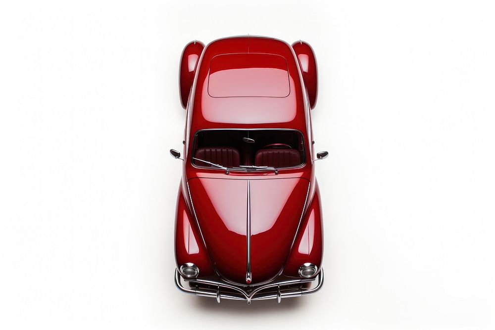 A red vintage car vehicle maroon white background.