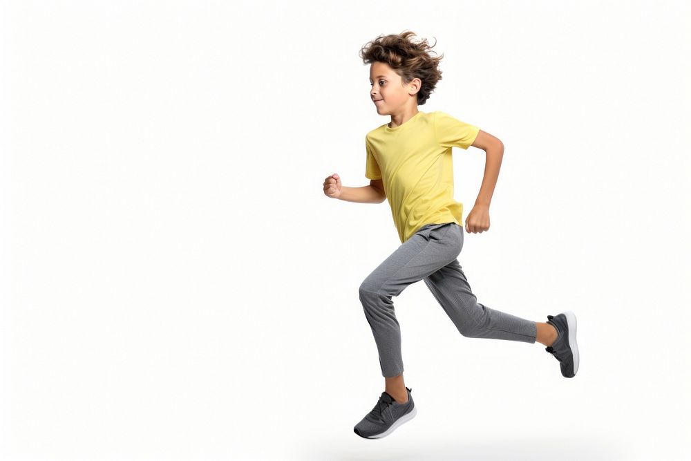 An eight year old wearing modern sport cloth running jumping sports white background.