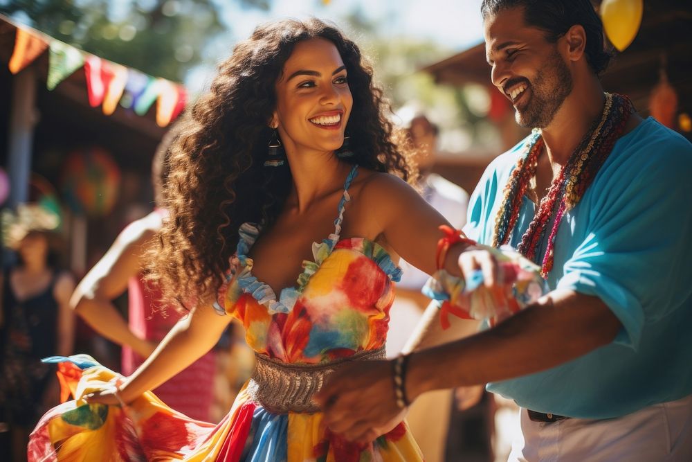 Latina and Latino in colorful costumes dancing celebration laughing smile.