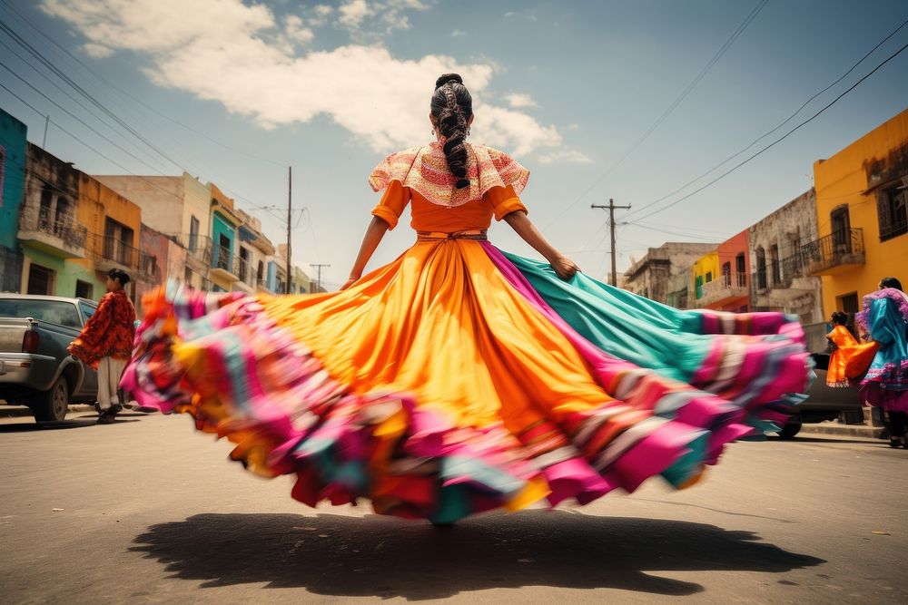 Mexican women dancer dressed with colorful skirts marching down a street in the country celebration dancing adult.