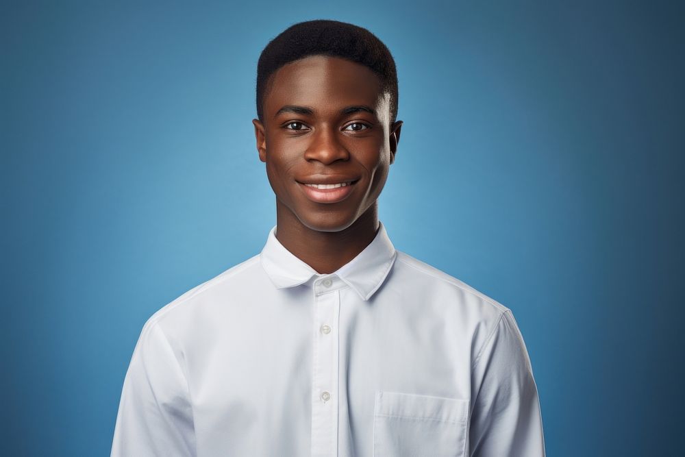 African student in white uniform portrait adult smile.