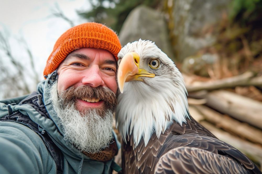 Eagle and man animal portrait smiling.