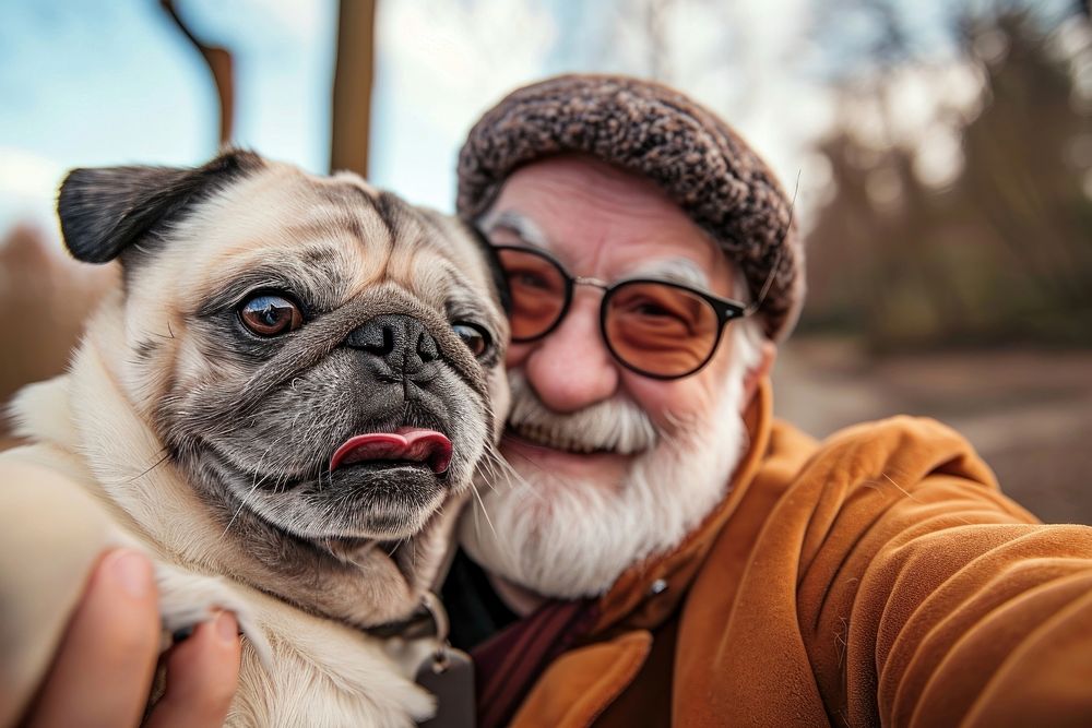 Pug and old man animal portrait smiling.