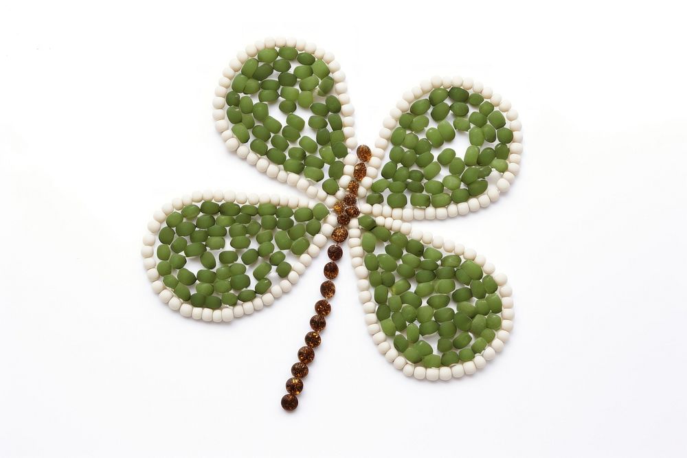  Clover jewelry bead white background. AI generated Image by rawpixel.
