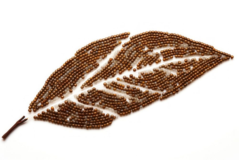  Leaf jewelry bead white background. AI generated Image by rawpixel.
