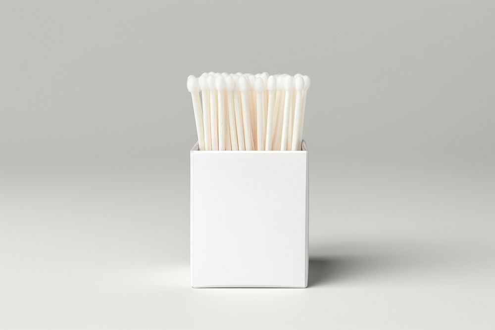 Cotton bud box packaging  gray background studio shot chopsticks.