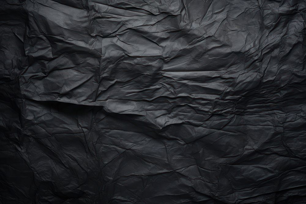 Black paper texture washi paper backgrounds crumpled wrinkled.