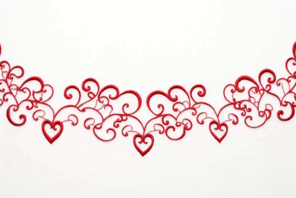 Embroidery of a heart border pattern calligraphy celebration.
