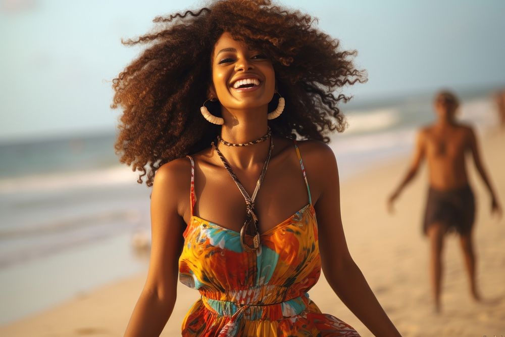 Happy African woman beach swimwear laughing.