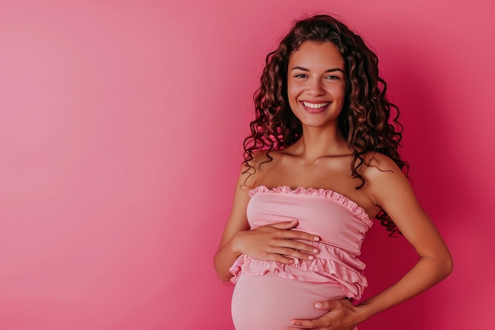 Pregnant woman smiling adult smile.