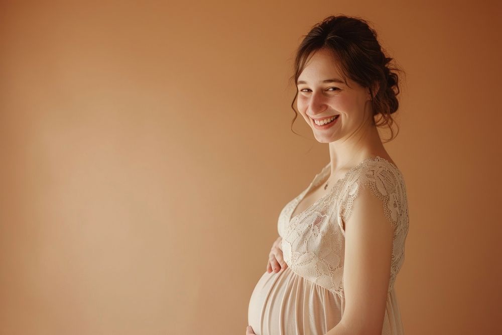 Pregnant woman photography portrait smiling.