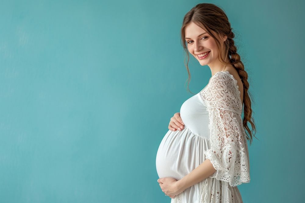 Pregnant woman photography portrait smiling.