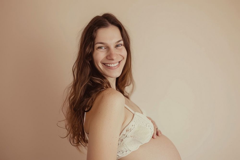 Pregnant caucasian woman photography portrait smiling.