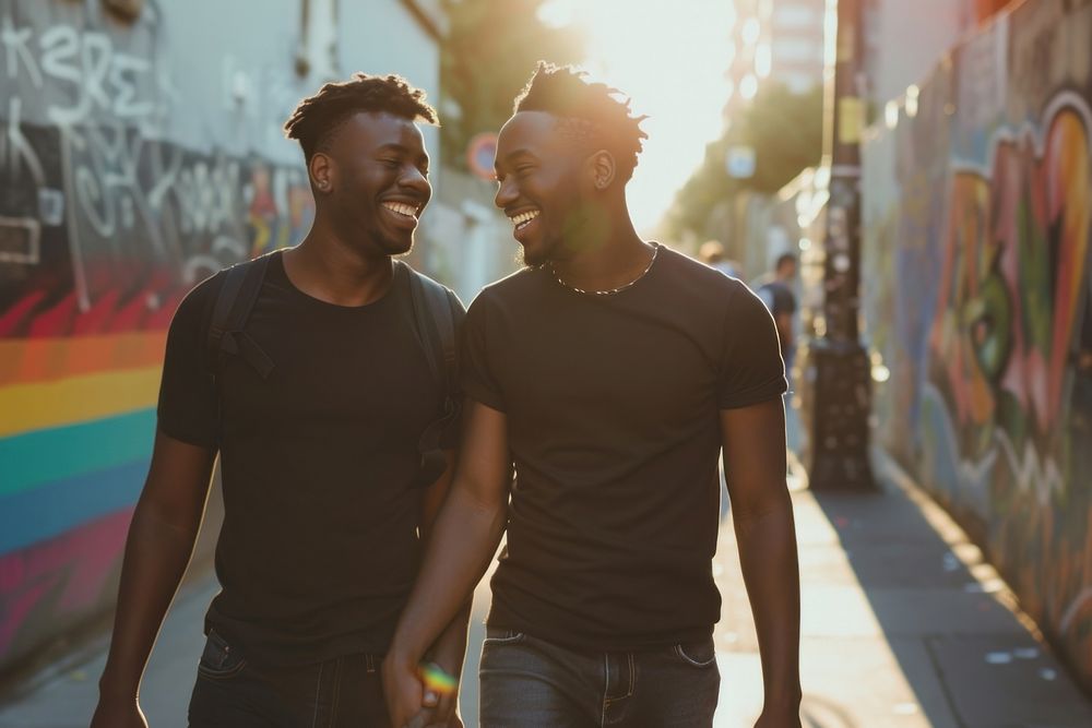 Black gay couple holding hands smiling street adult.