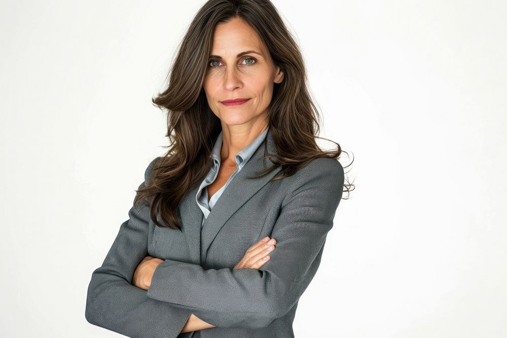 Good-looking middle-aged businesswoman with arms crossed portrait blazer adult.