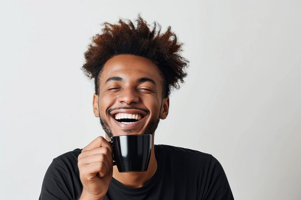 Happy man drinking black coffee laughing smile cup.