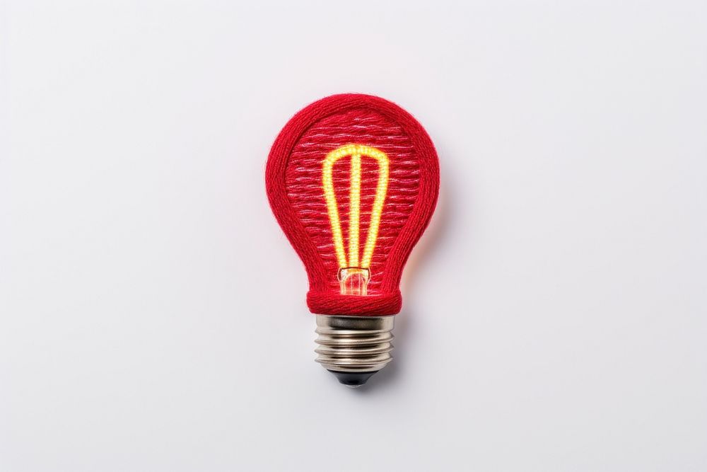 Light bulb in embroidery style lightbulb illuminated electricity.