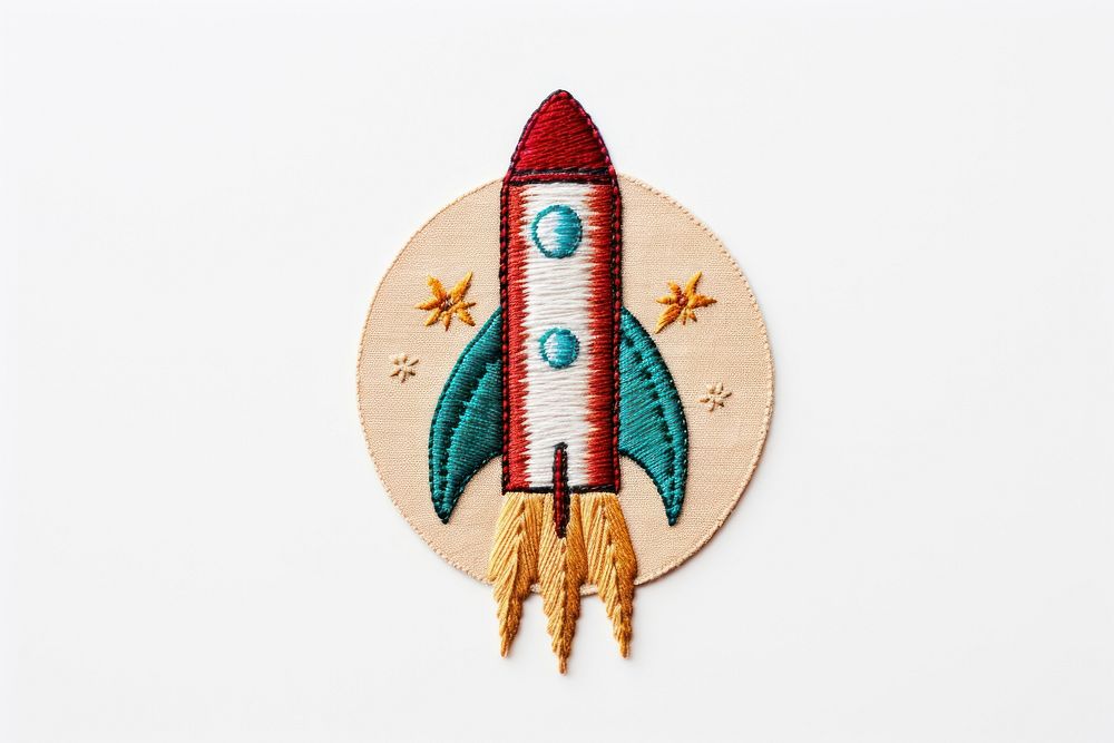 Rocket in embroidery style creativity handicraft weaponry.