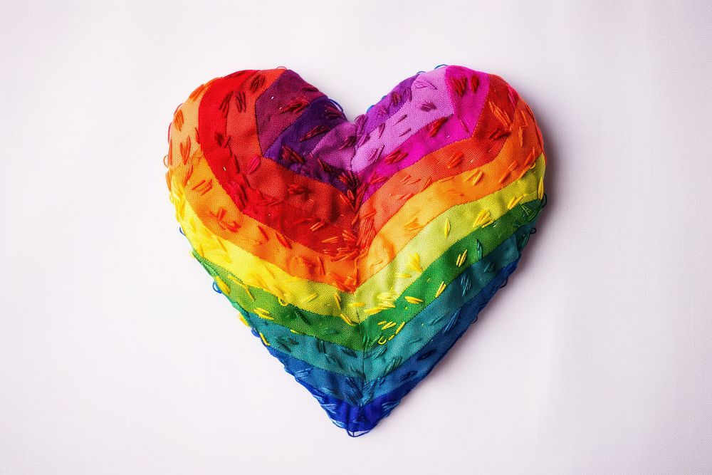 Rainbow heart in embroidery style celebration creativity clothing.