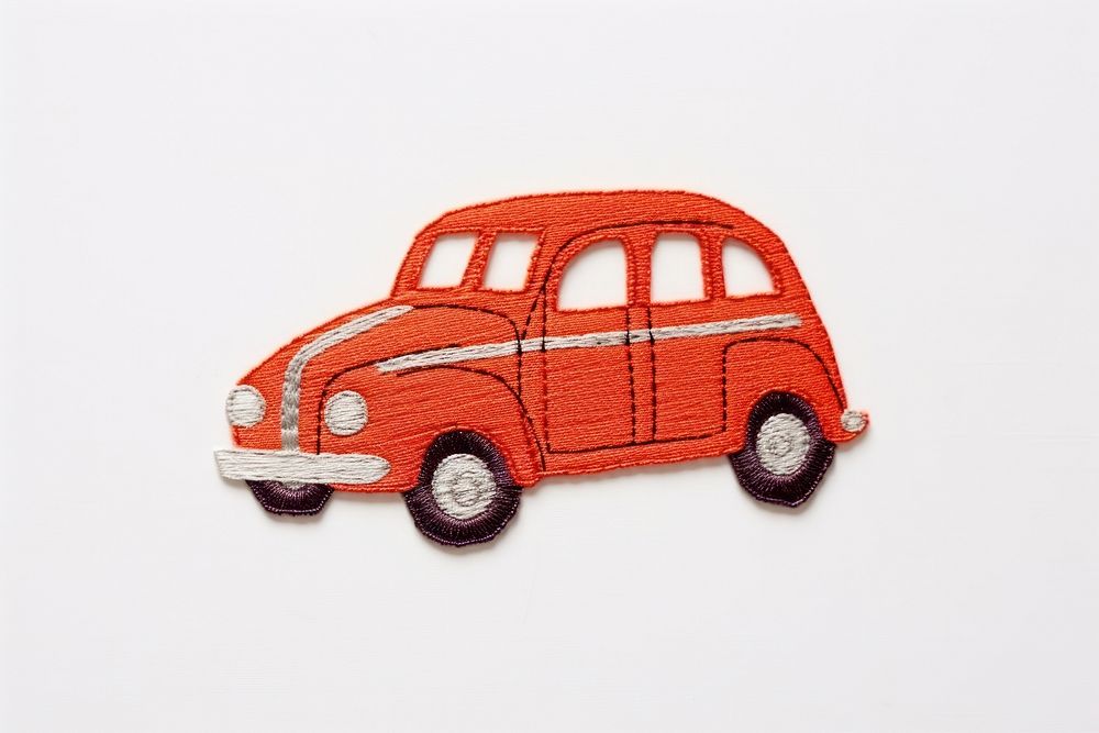 Toy car in embroidery style vehicle wheel art.