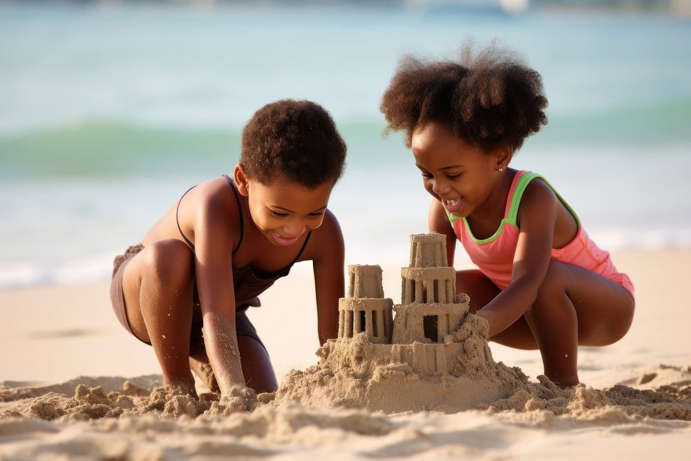Black kids building sand castle outdoors summer child.
