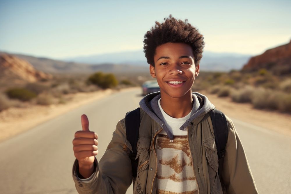African American teen man portrait travel desert.