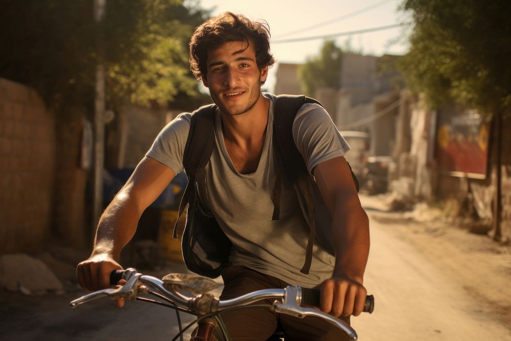 Palestinian young man portrait cycling bicycle.