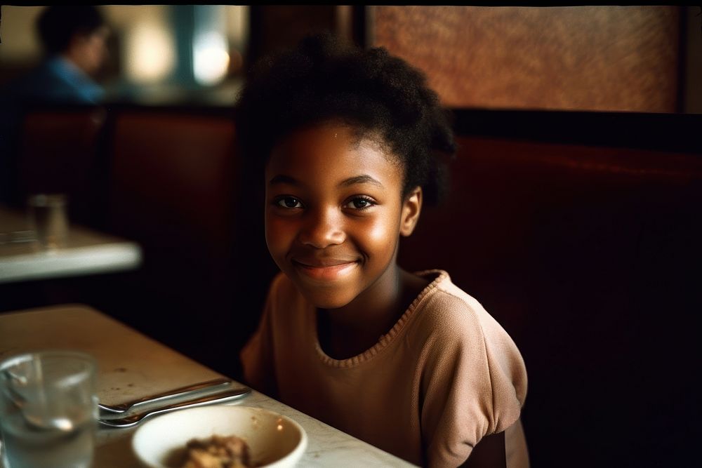 African American girl food restaurant portrait.