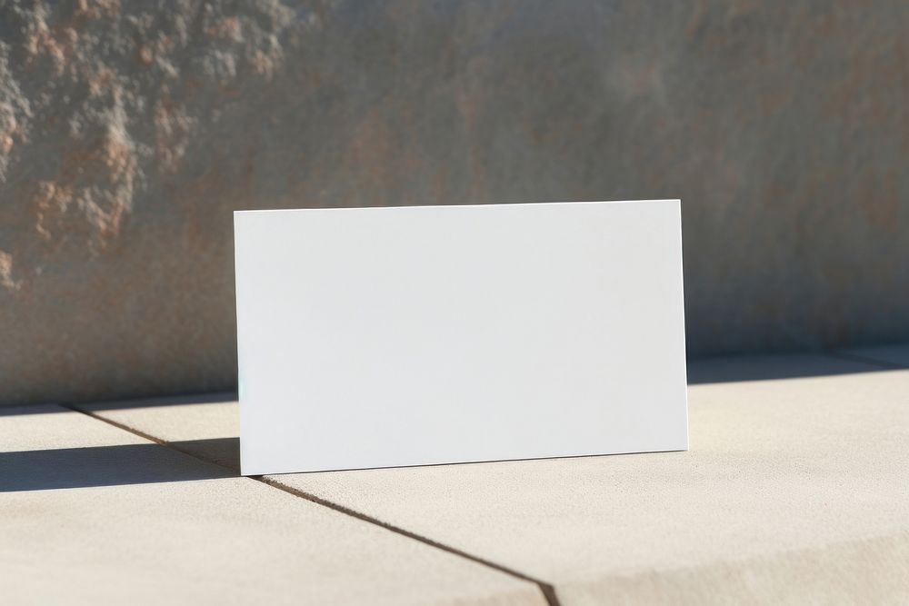 One business card packaging  white paper wall.