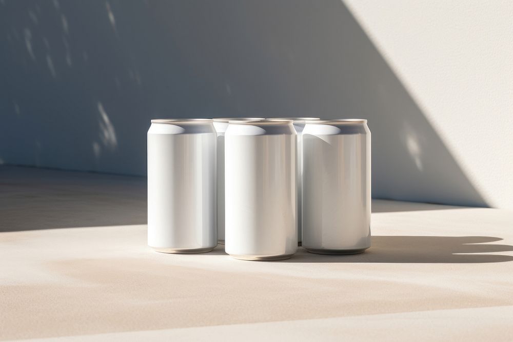 Cans in box packaging  cylinder shadow refreshment.