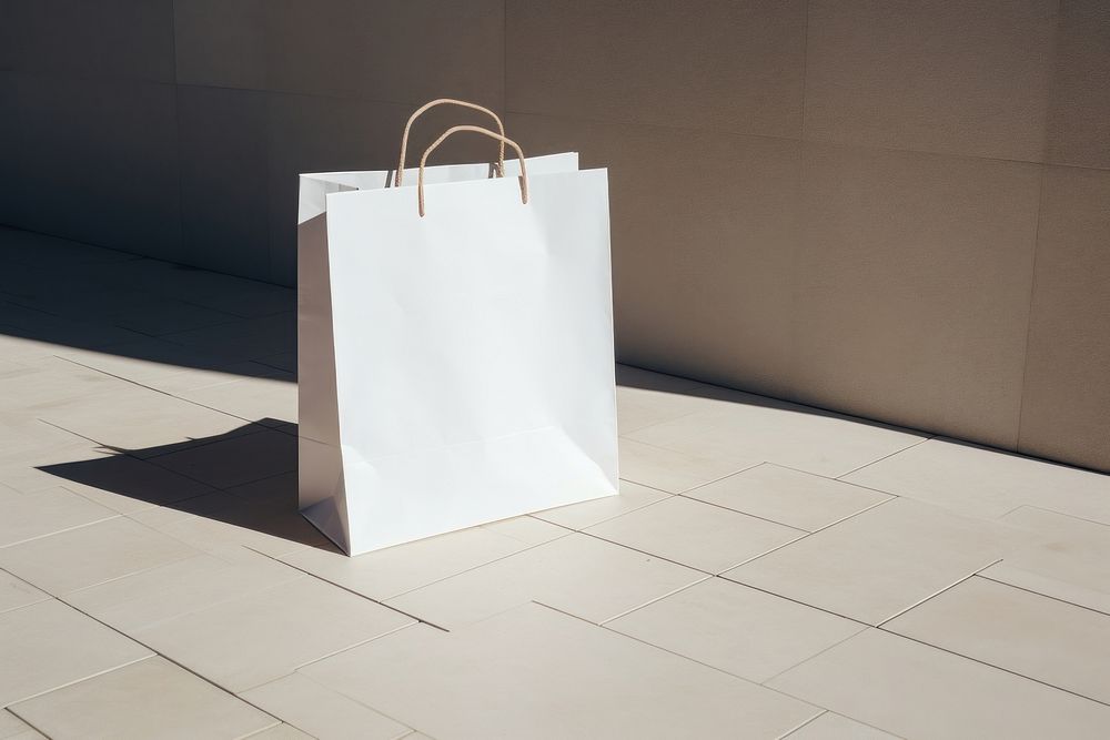 Paper bag packaging  handbag shadow white.
