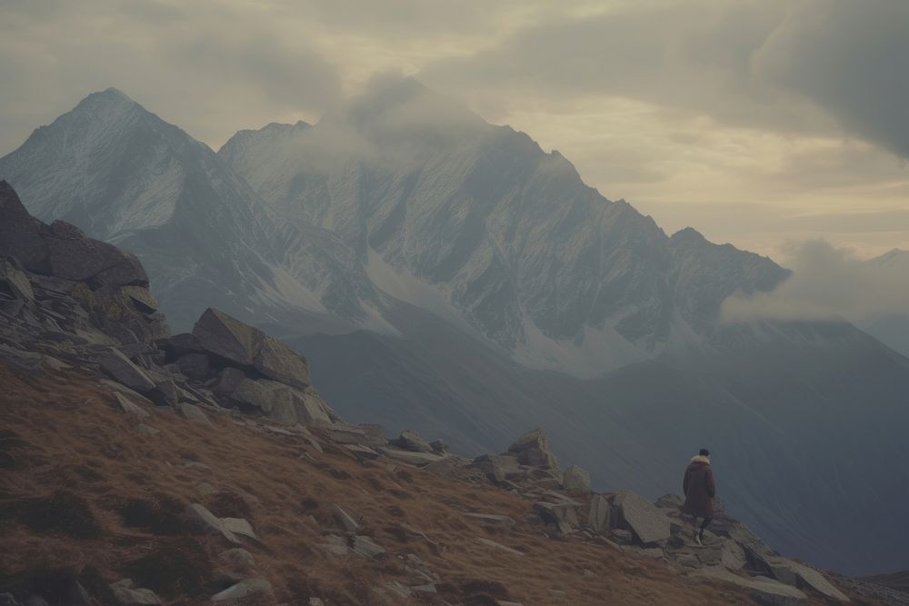 Person climbs up mountain wilderness landscape. AI generated Image by rawpixel.