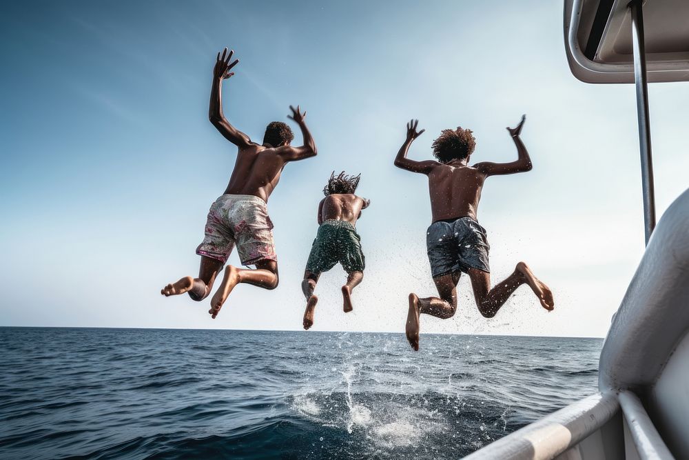 Multiracial friends jumping vacation summer.