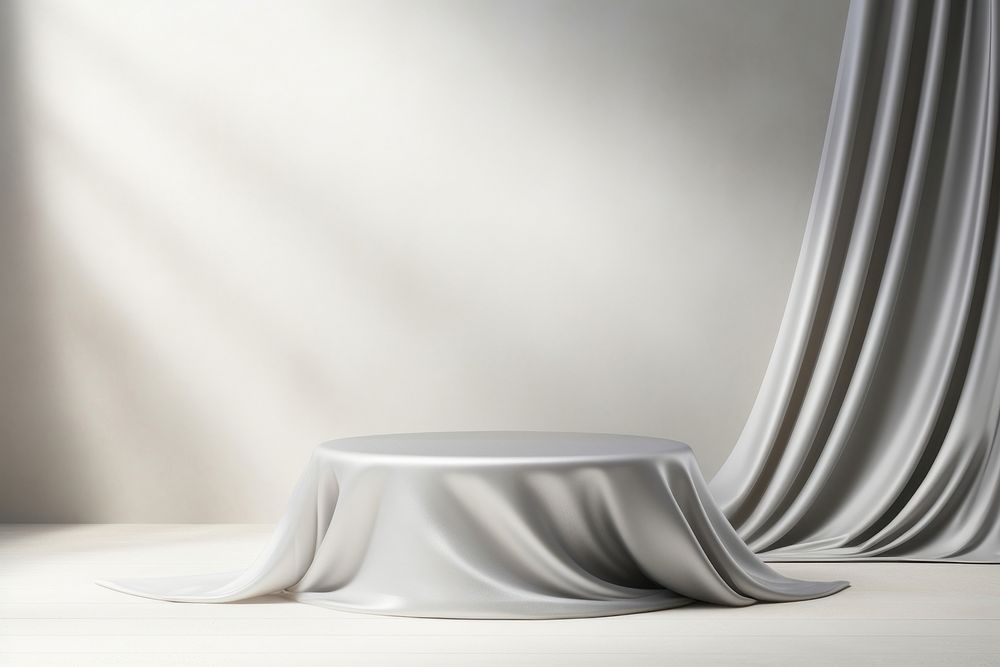 Silver fabric background tablecloth furniture appliance.