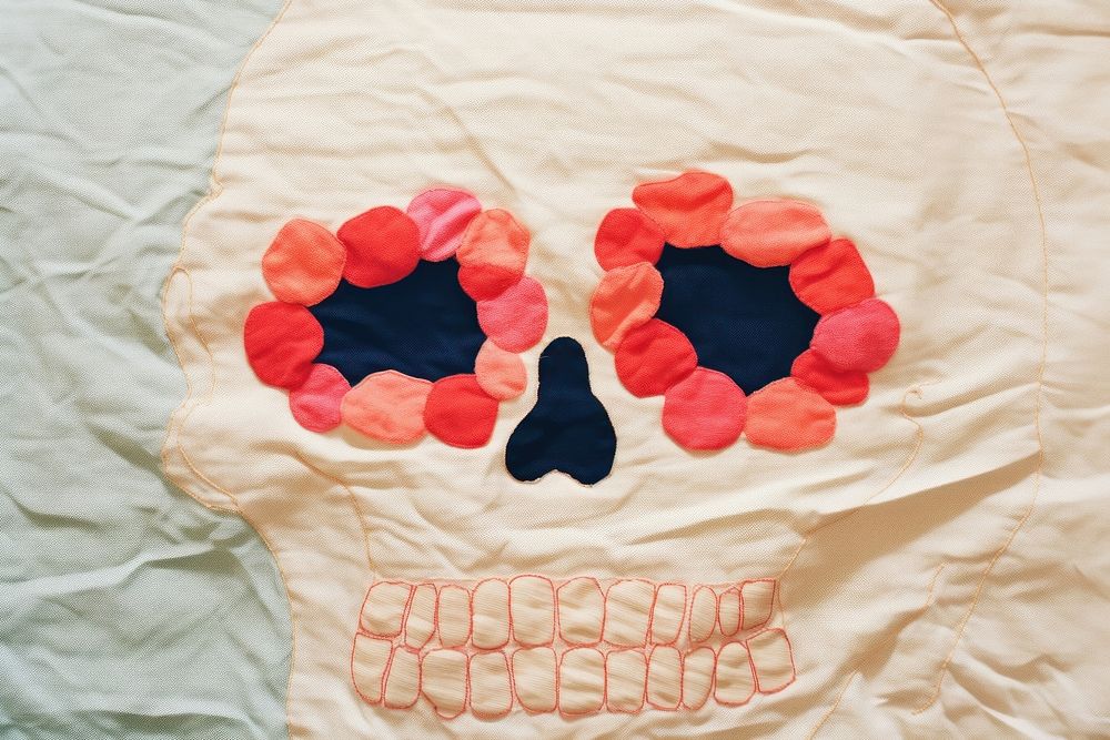 Simple abstract fabric textile illustration minimal of a skull pattern quilt art.