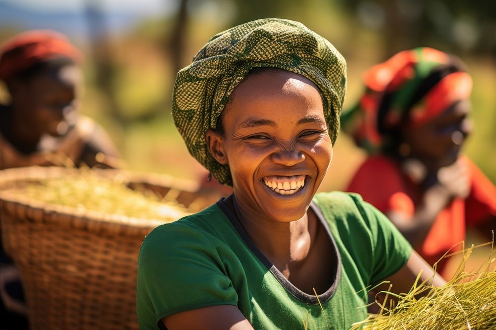 African women doing farm laughing smiling smile.