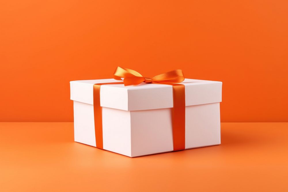 Gift box  orange background anniversary celebration.