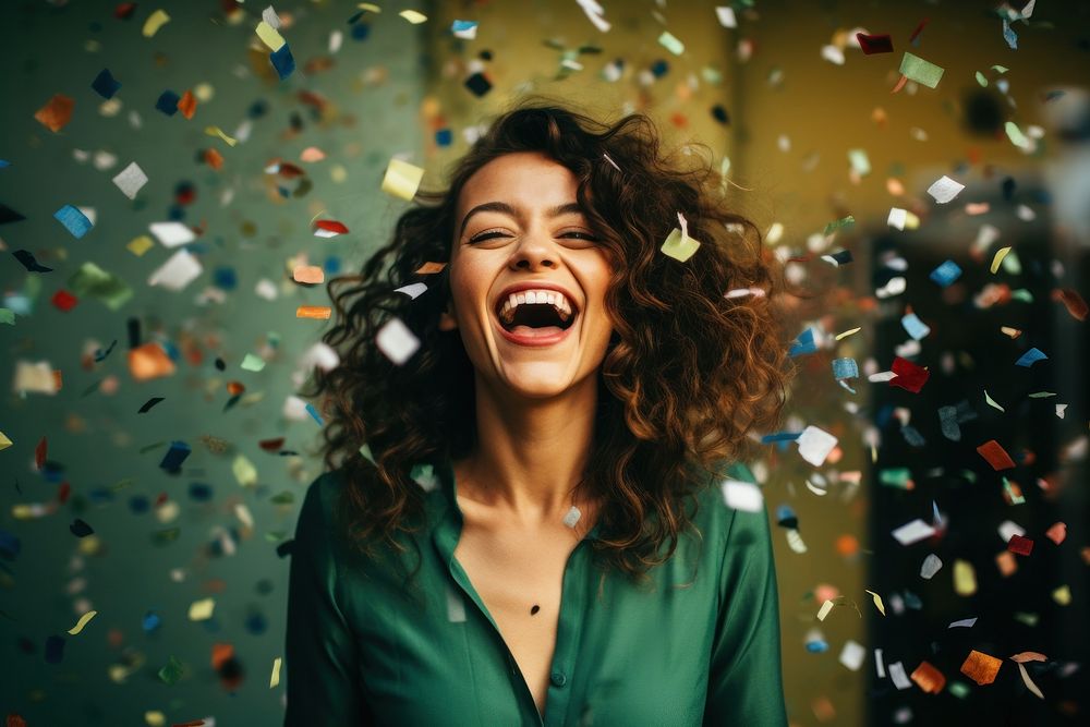 Cheerful woman cheerful laughing confetti.