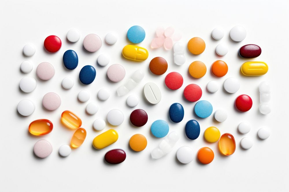 Different colorful medicines pill white background medication.