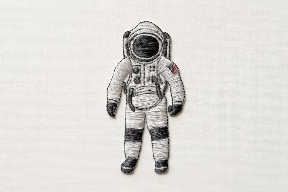 The astronaut in embroidery style representation illustrated clothing.