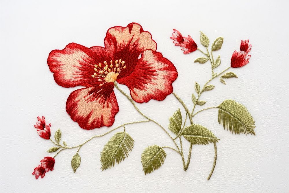 The flower in embroidery style needlework hibiscus pattern.