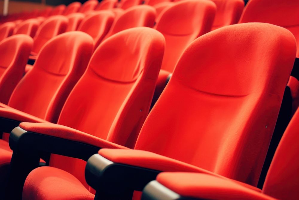 Red seats theater chair red. AI generated Image by rawpixel.