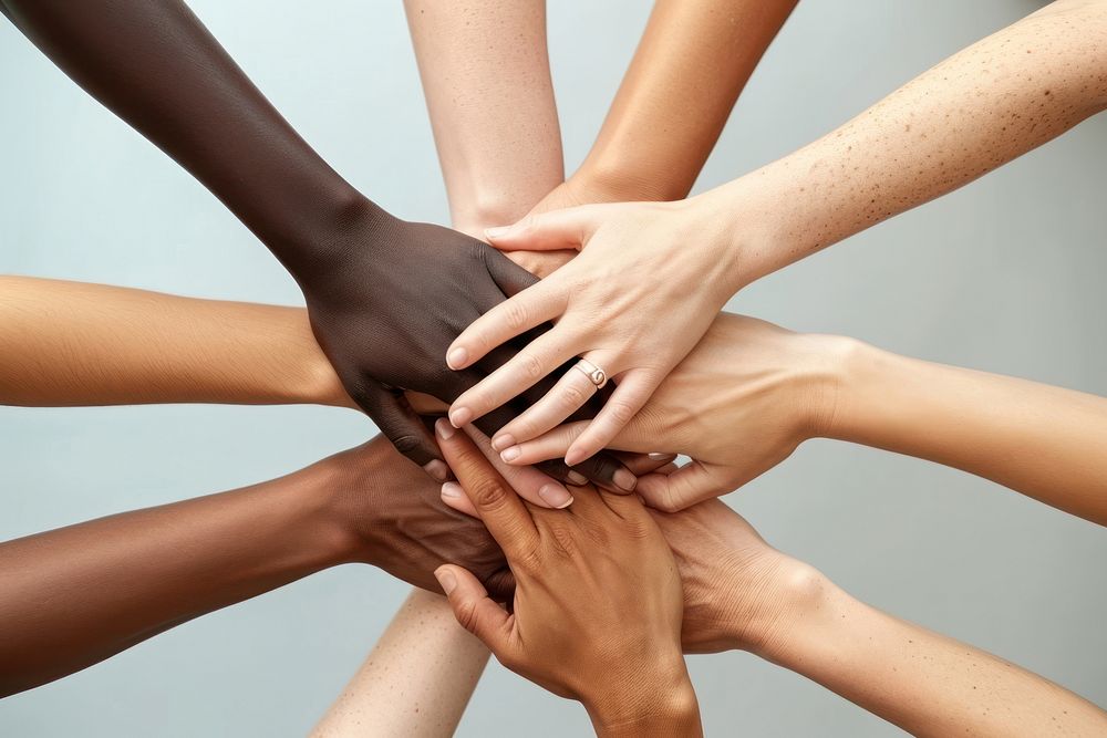 Group of hands together unity togetherness massage.