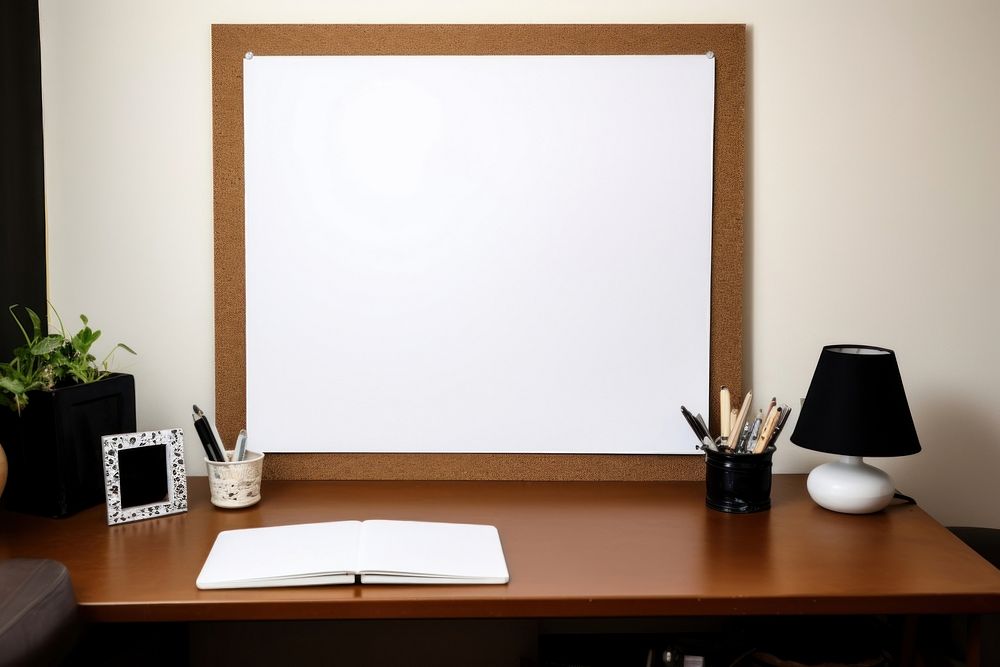 Cork board with white polaroid furniture table desk.