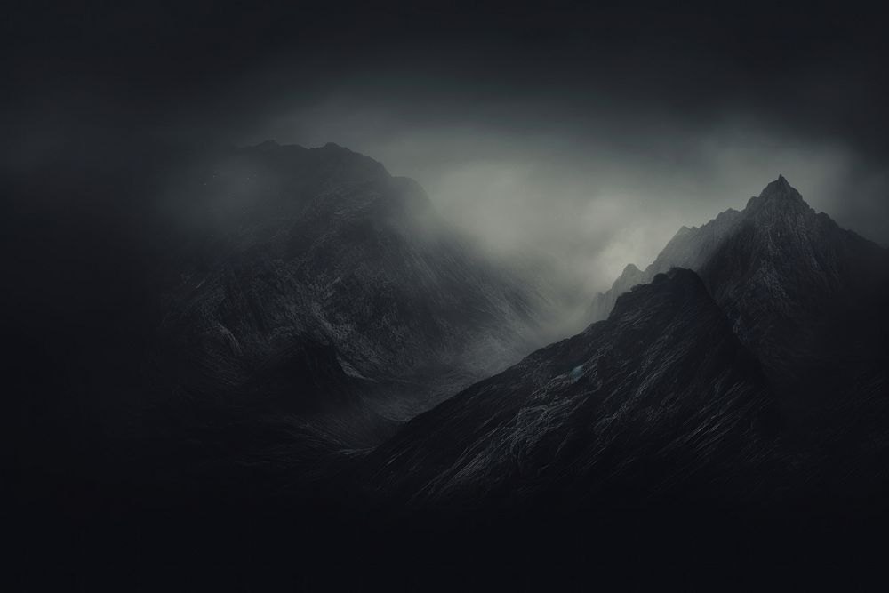 Dark background mountain mist monochrome.